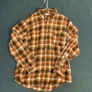 Cozy poly/wool flannel top.  Women’s size L.  Never worn. Spare button incl.